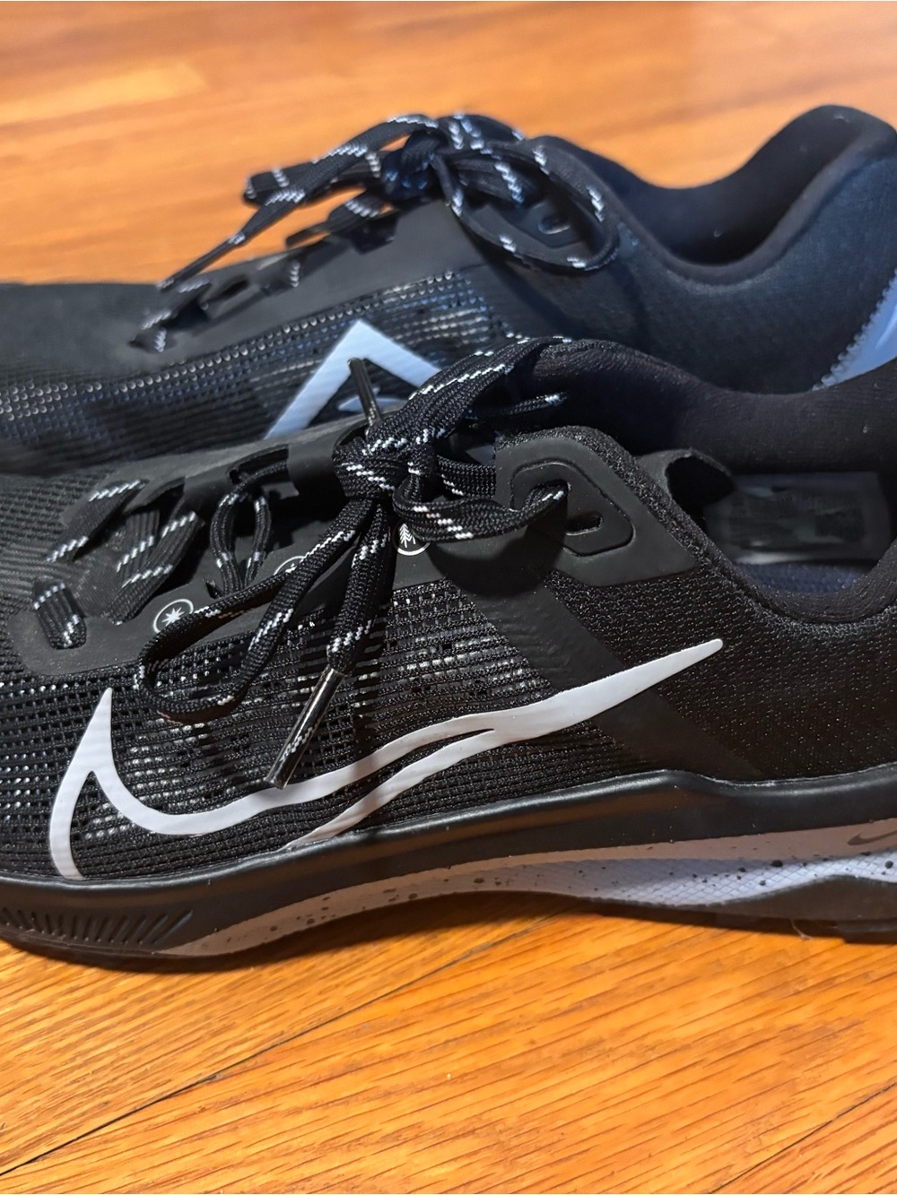 Nike Kiger Women’s Black Athletic Shoes Trail Runners with White Swoosh